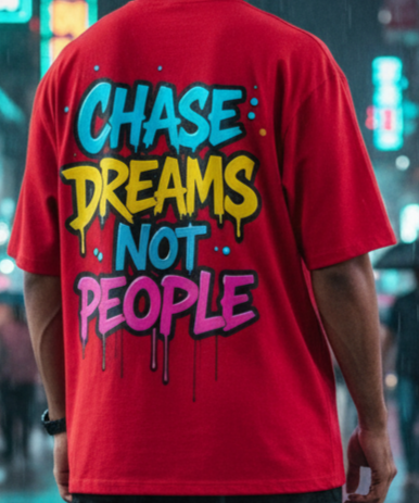 "CHASE DREAMS NOT PEOPLE" Oversized Red T-Shirt - Bold Graffiti Motivational Tee